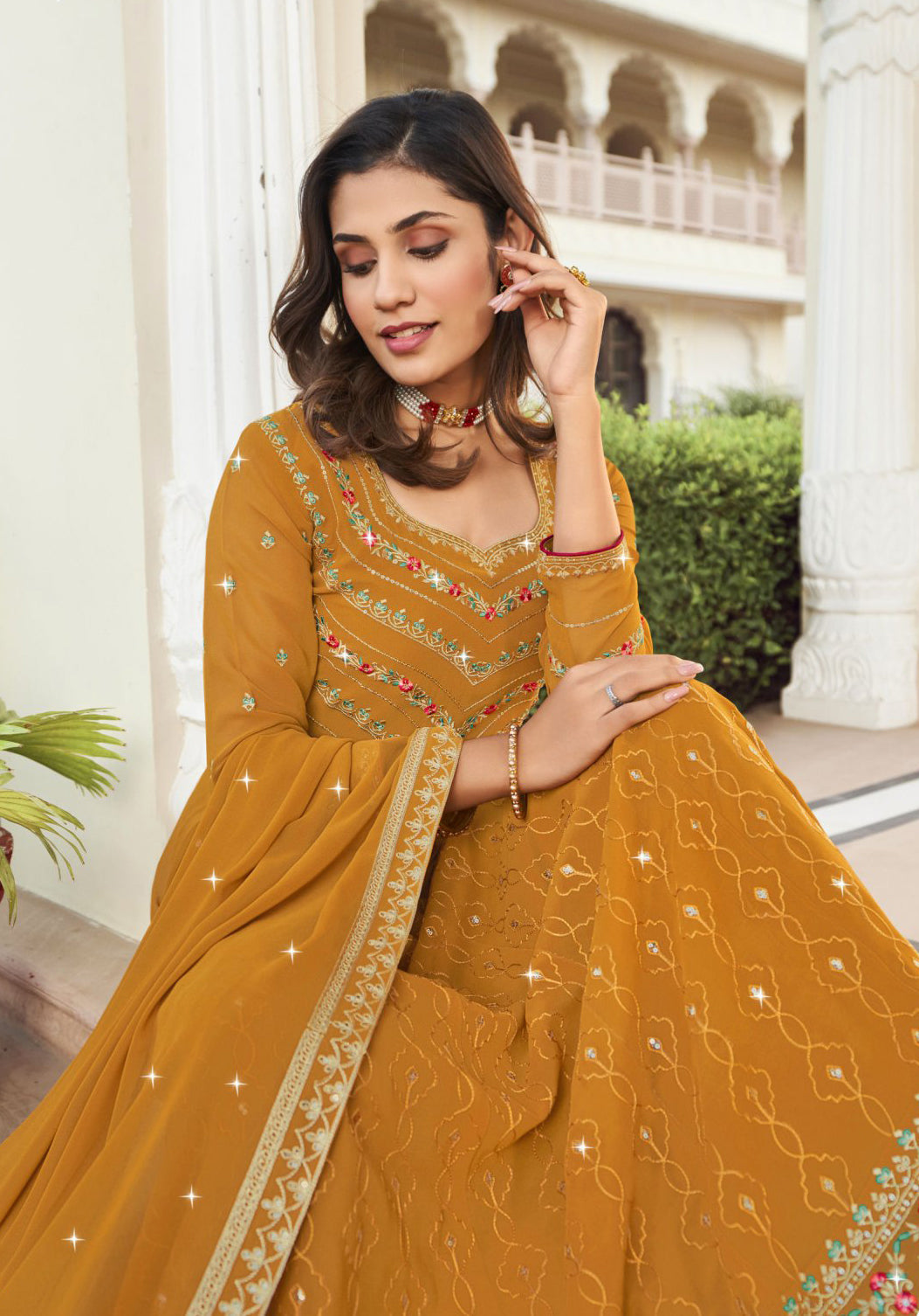 Radiant Yellow Georgette Salwar Kameez adorned with Intricate Embroidery - Elegance Redefined!