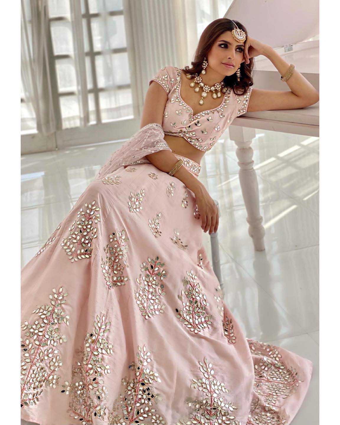 Radiant Rose Gold Lehenga Choli: A Fusion of Elegance and Handcrafted Opulence