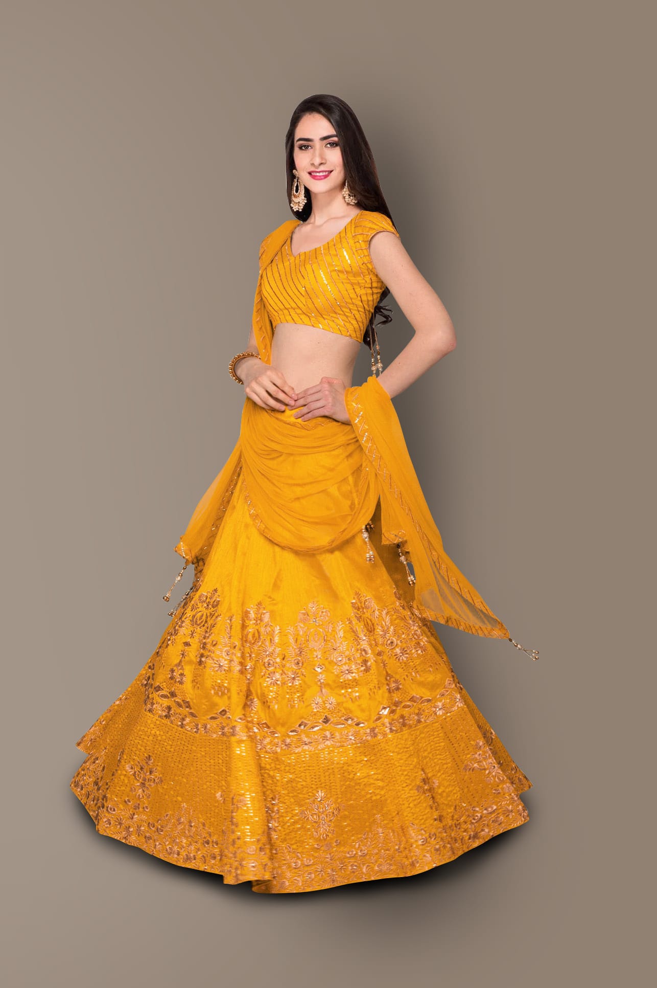 Radiant Yellow Lehenga Choli with Zari, Stone, and Sequins Embroidery