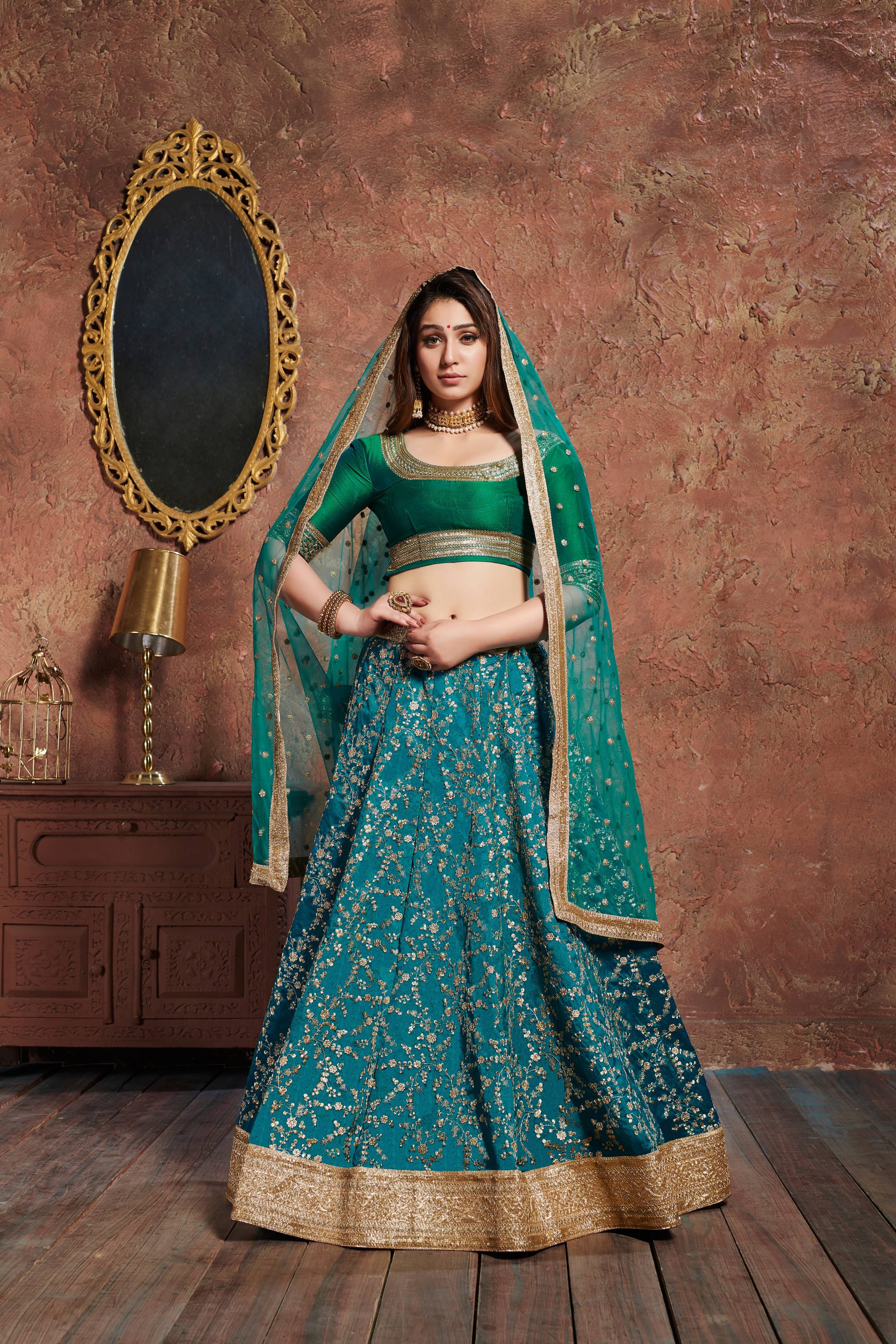 Turquoise Elegance: Lehenga Choli adorned with Zari, Sequins, and Dori Embroidery