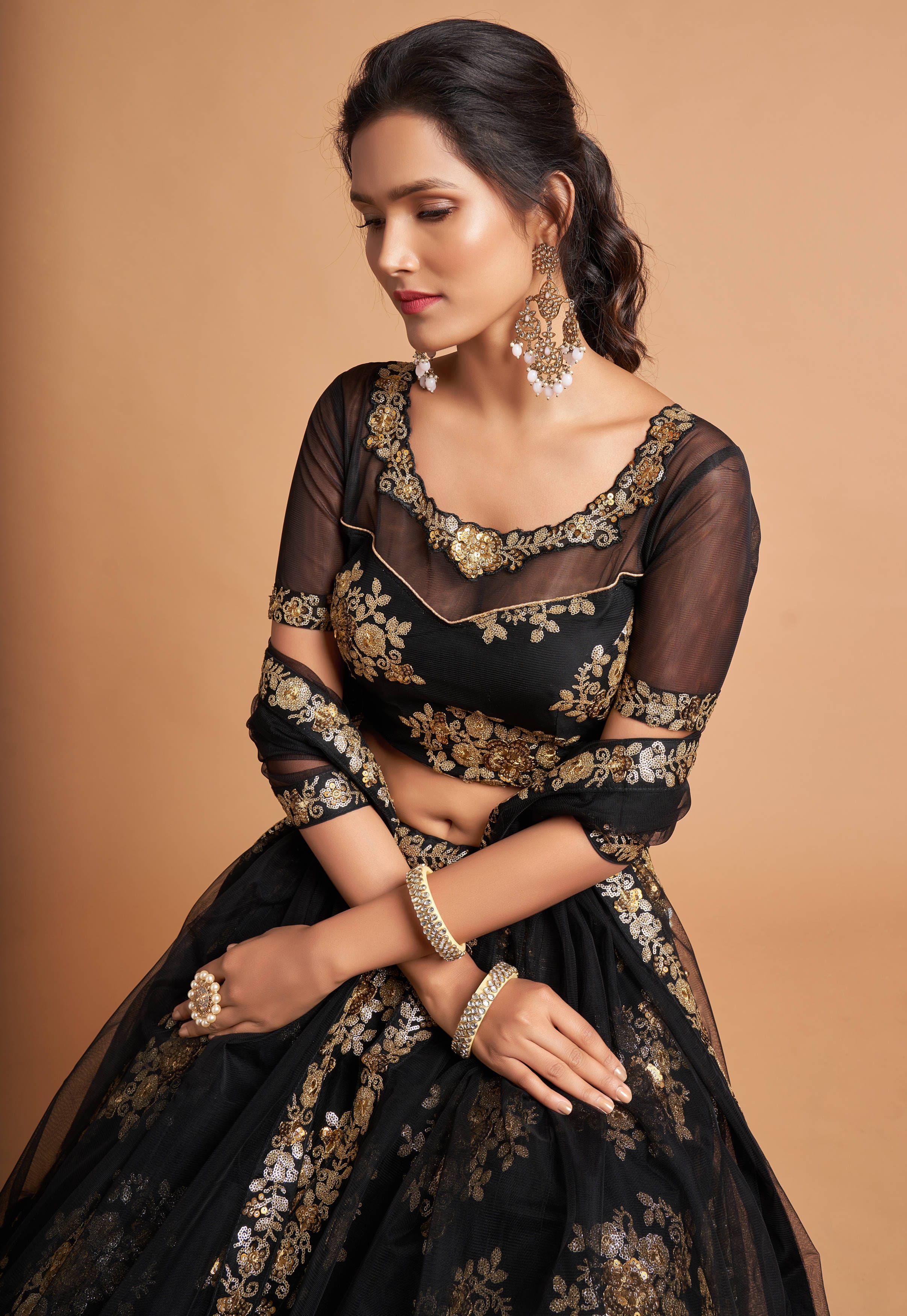 Elegance Redefined: Black Zari Lehenga Choli Adorned with Multitude of Sequin Embroidery