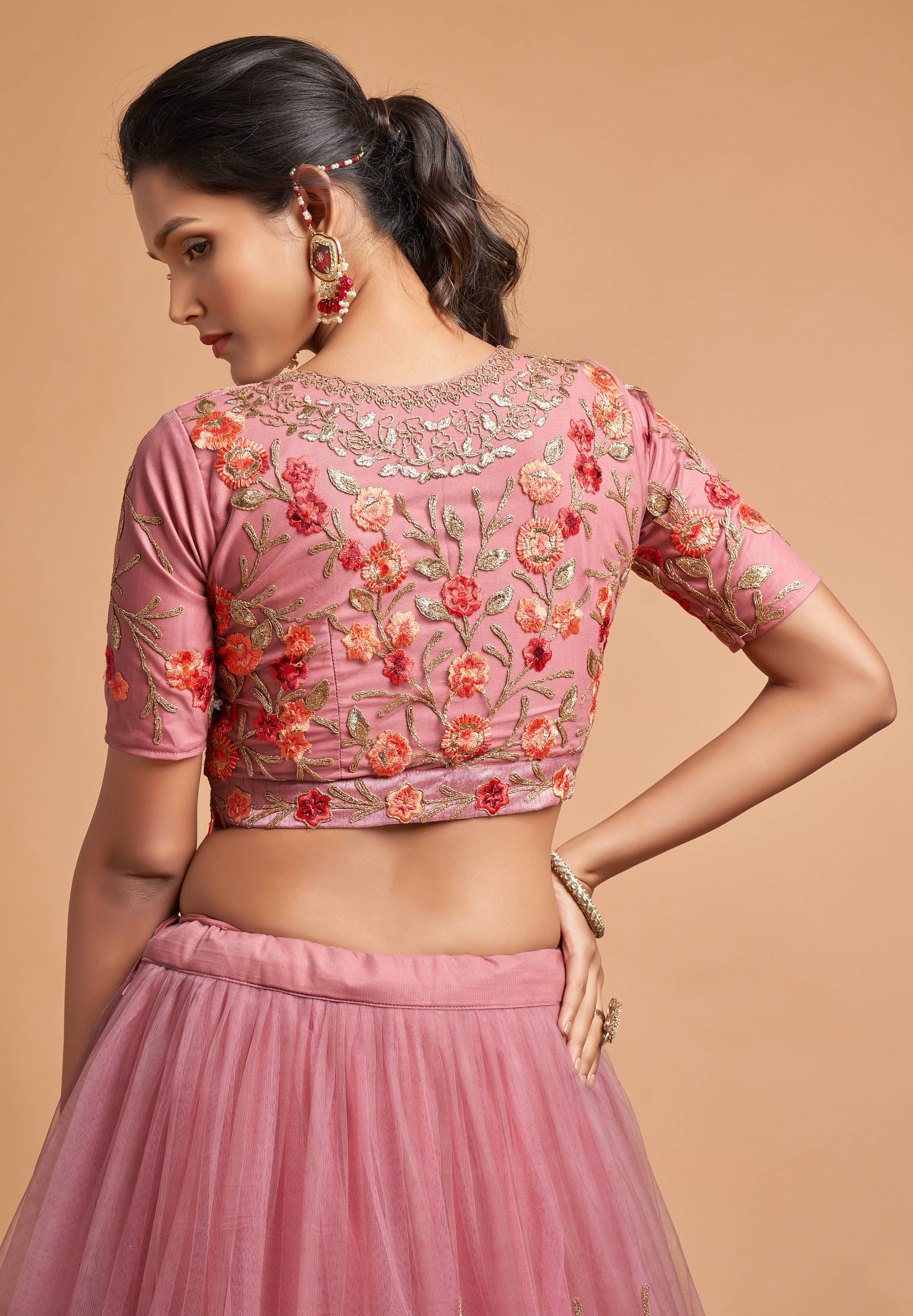 Dusty Pink Lehenga Choli adorned with Zari, Badla, Dori, and Thread Embroidery Work