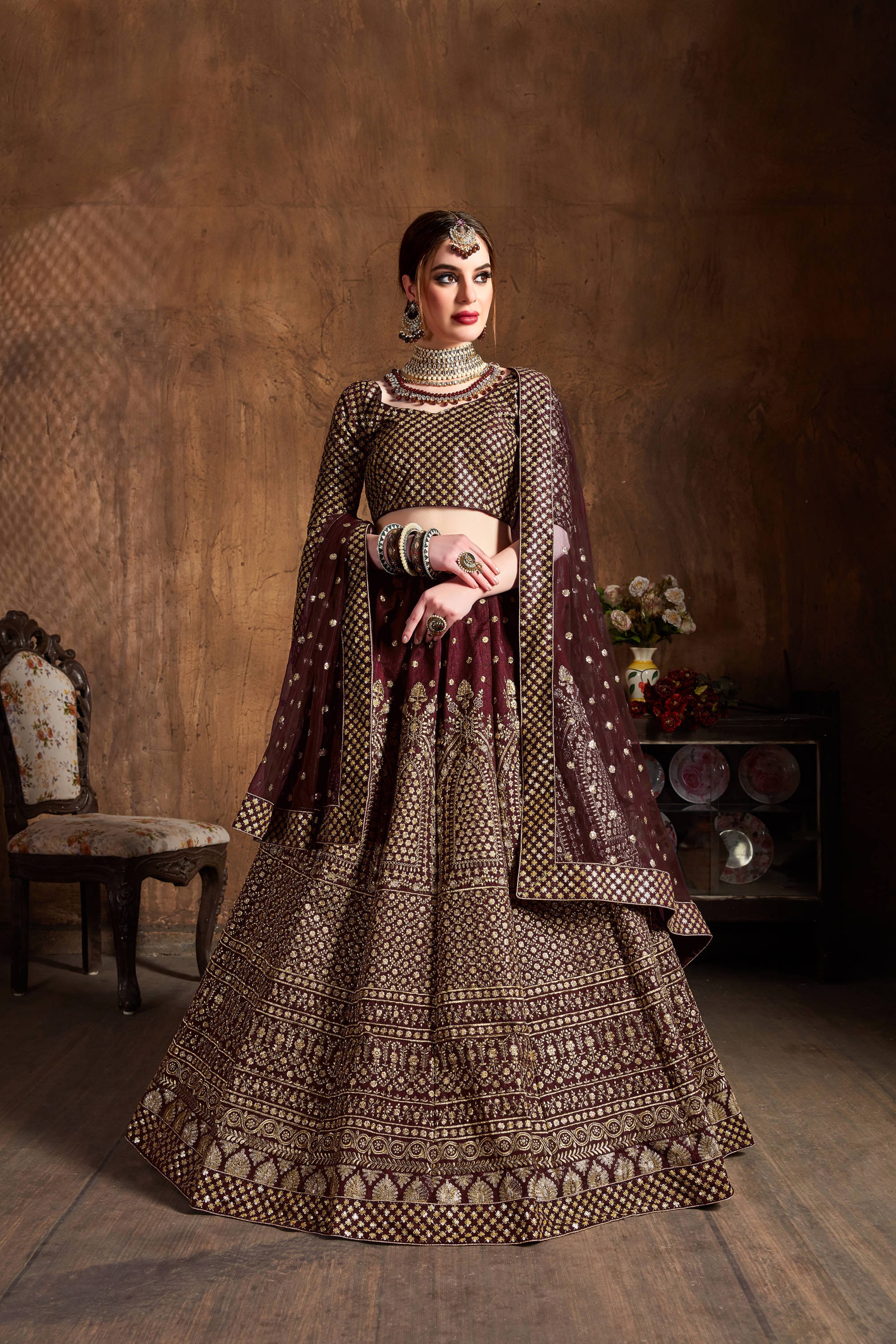 Maroon and Gold Elegance: Glittering Sequin Embroidered Lehenga Choli in Raw Silk