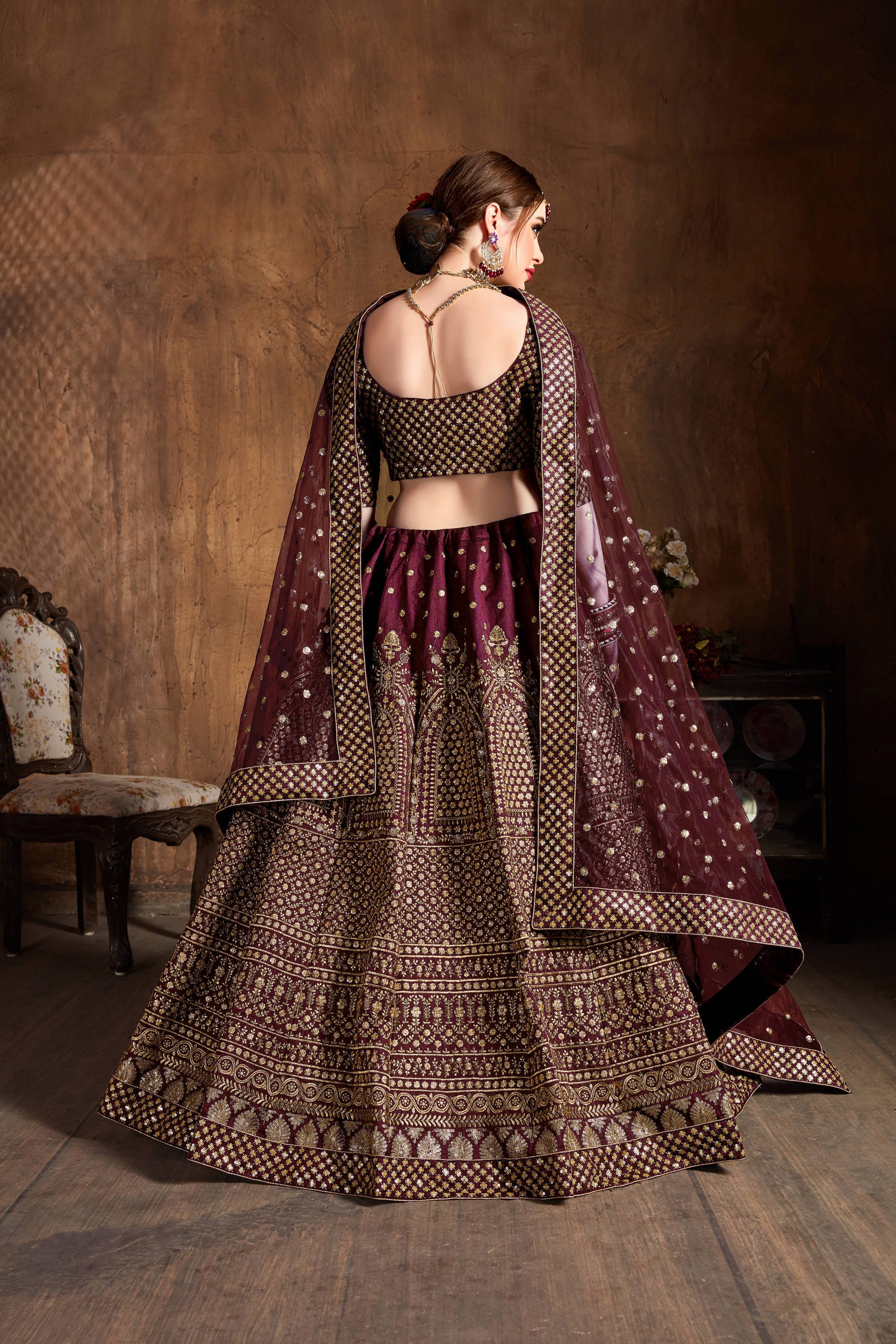 Maroon and Gold Elegance: Glittering Sequin Embroidered Lehenga Choli in Raw Silk