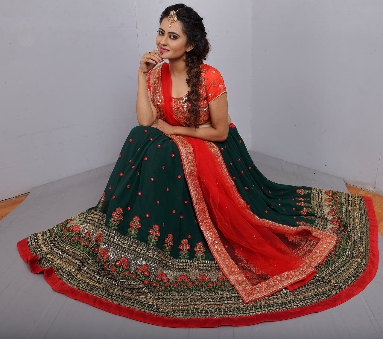 Enchanting Dark Green Lehenga Choli: Intricate Multi-Thread Sequences on Faux Georgette