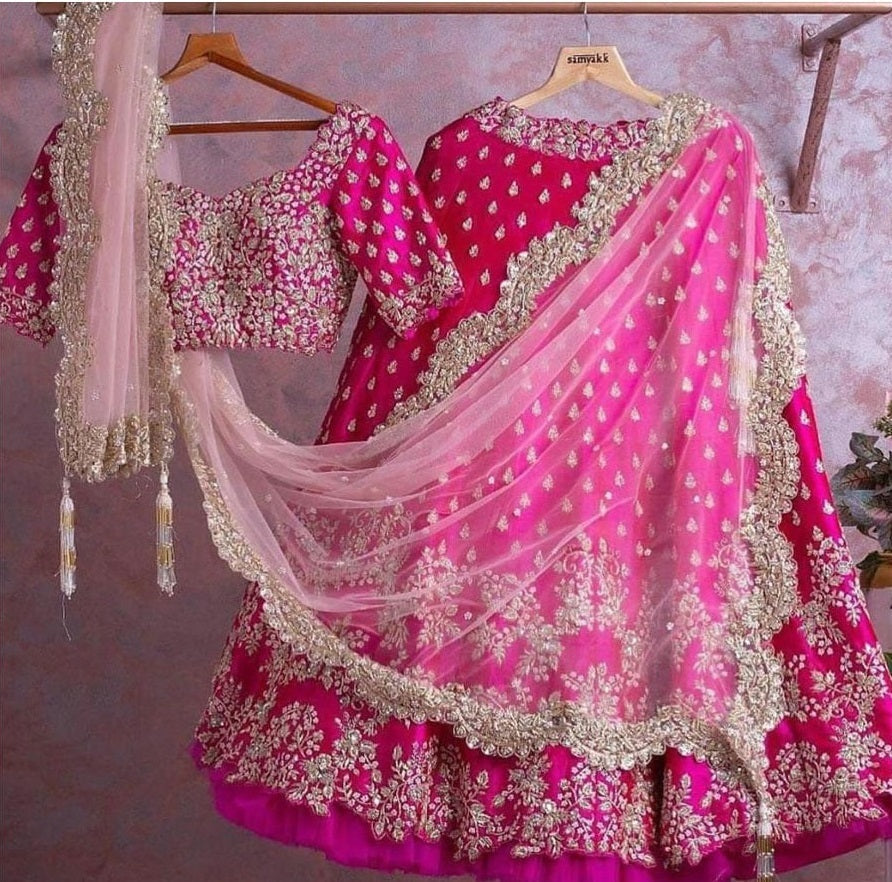 Enchanting Dark Pink Lehenga Choli Adorned with Intricate Corded Sequin Embroidery