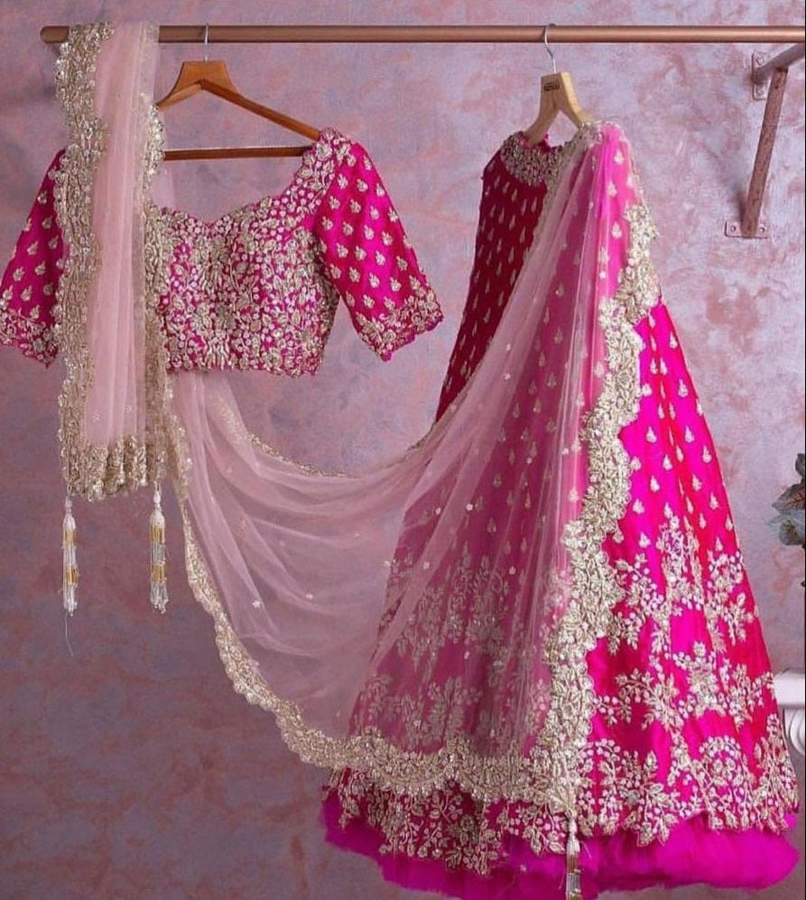 Enchanting Dark Pink Lehenga Choli Adorned with Intricate Corded Sequin Embroidery