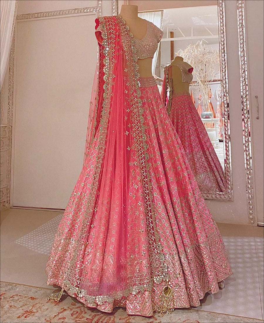 Pink Faux Georgette Lehenga Choli adorned with Intricate Cord Sequins and Mirrors