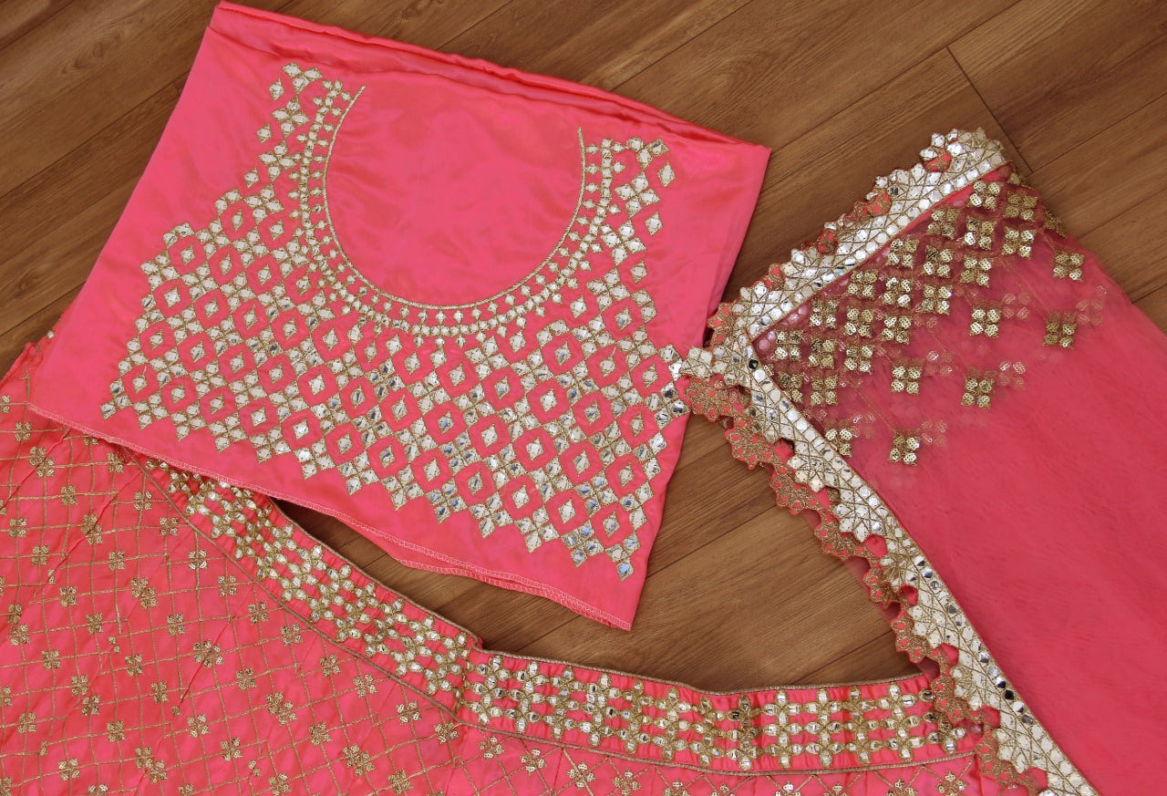 Pink Faux Georgette Lehenga Choli adorned with Intricate Cord Sequins and Mirrors