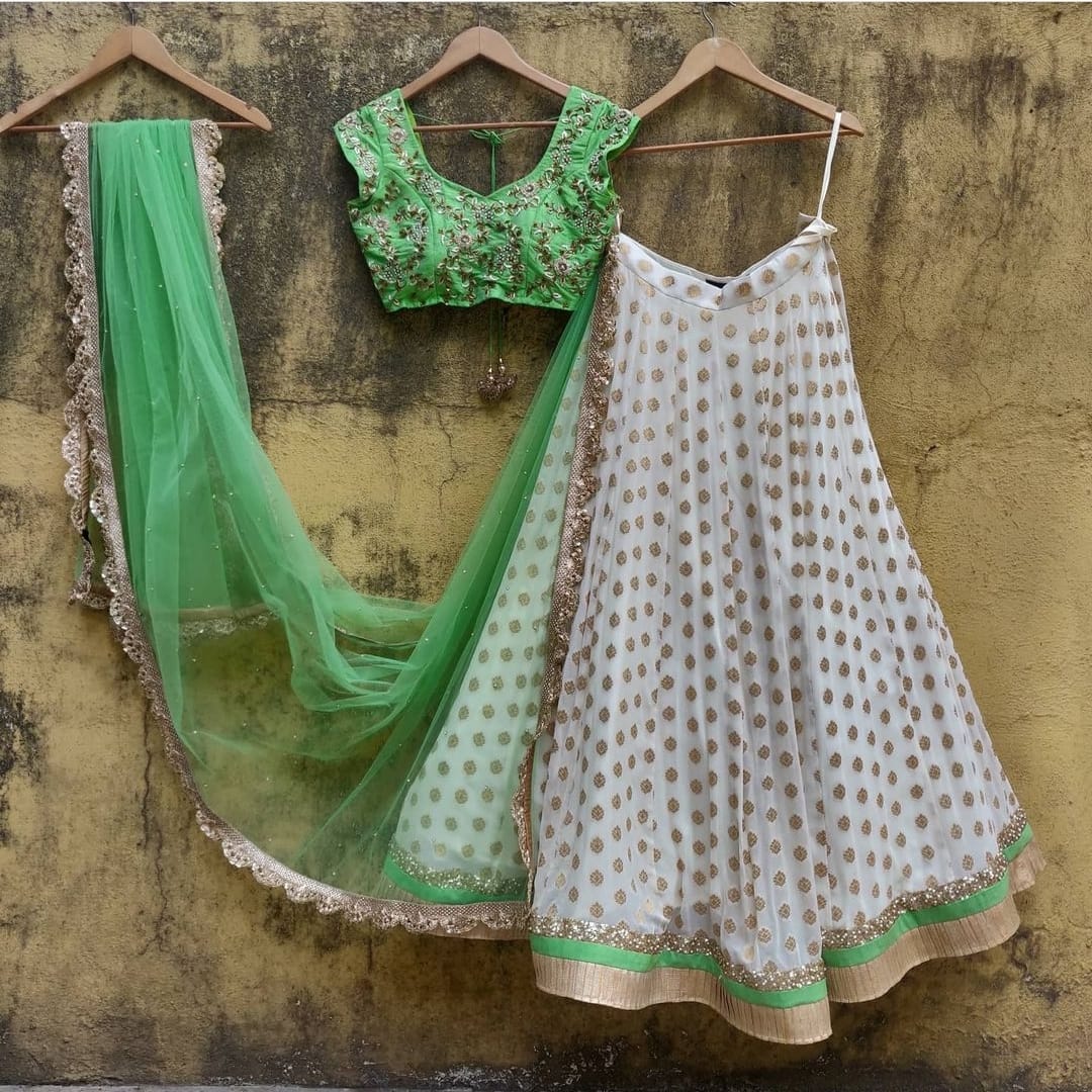 Elegant White-Green Lehenga Choli with Exquisite Thread-Sequence Embroidery and Banarasi Silk Jacquard