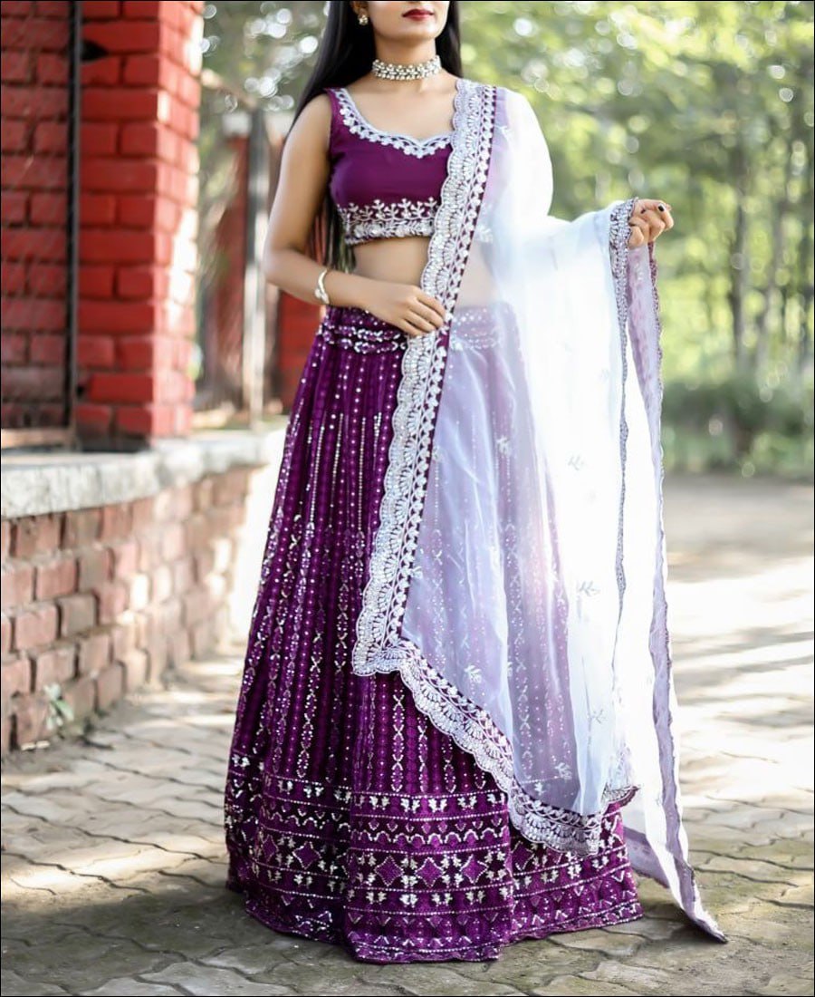 Elegant Purple Lehenga Choli adorned with Intricate Multi-Thread Sequence Embroidery