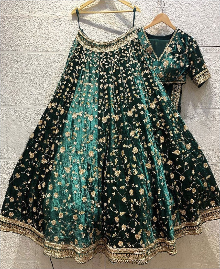 Opulent Emerald Elegance: Green Lehenga Choli with Intricate Cord and Sequin Embroidery