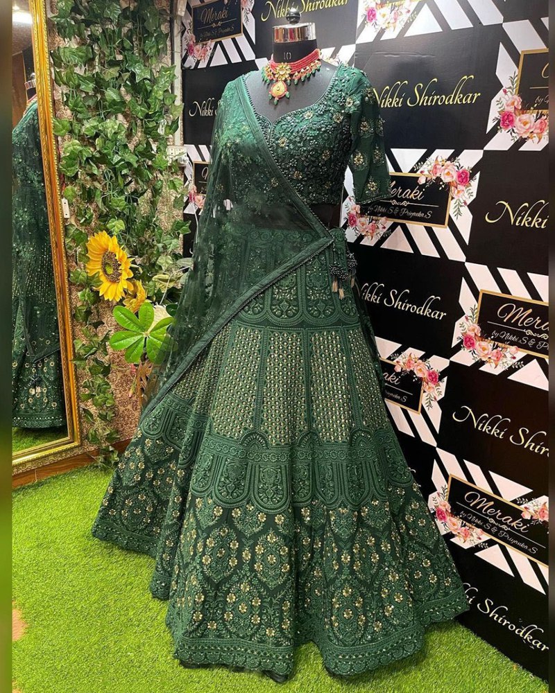 Enchanting Green Lehenga Choli Adorned with Intricate Thread Sequence Embroidery