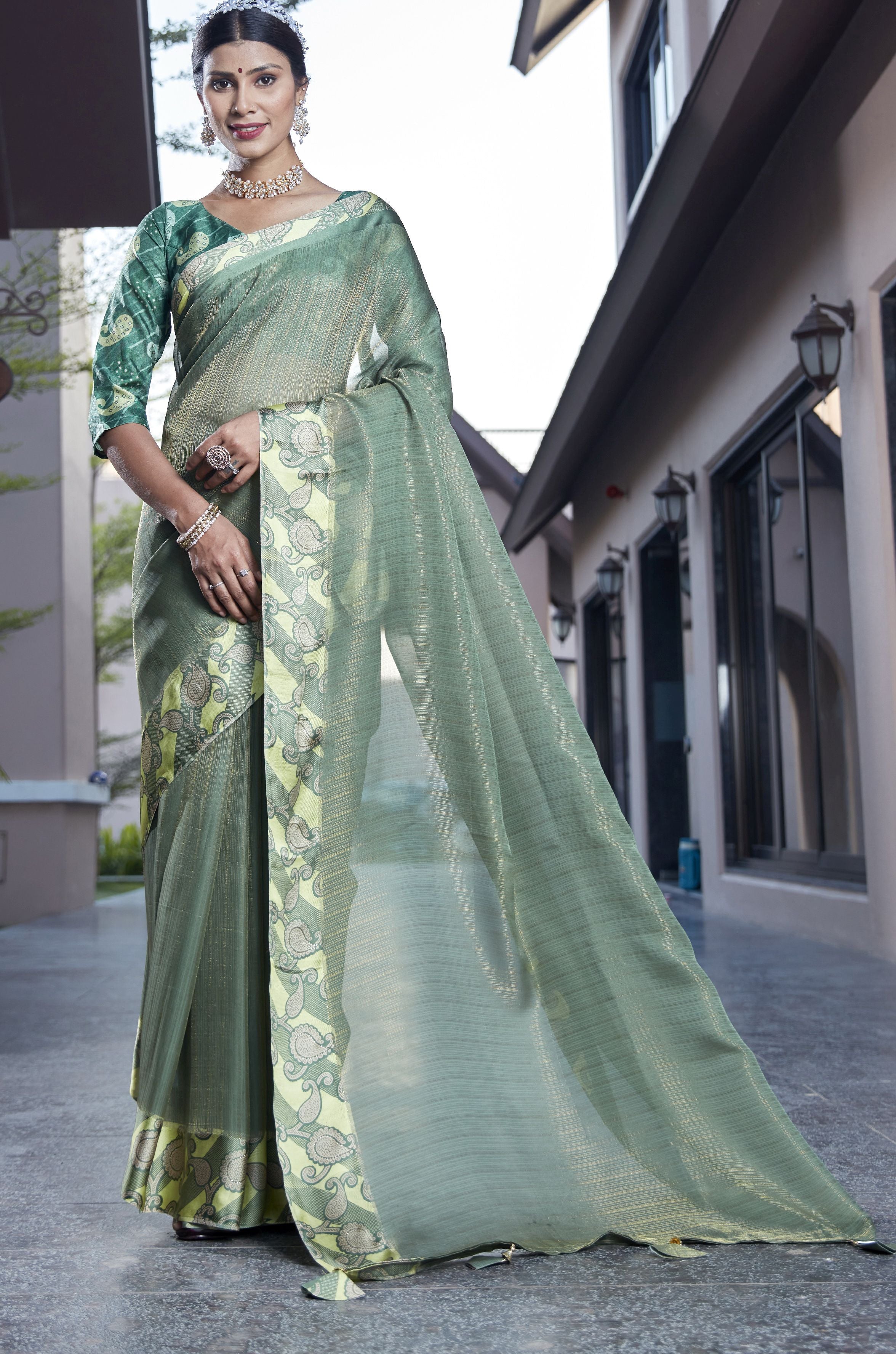 Enchanting Emerald Elegance: Green Soft Silk Saree for Weddings and Parties