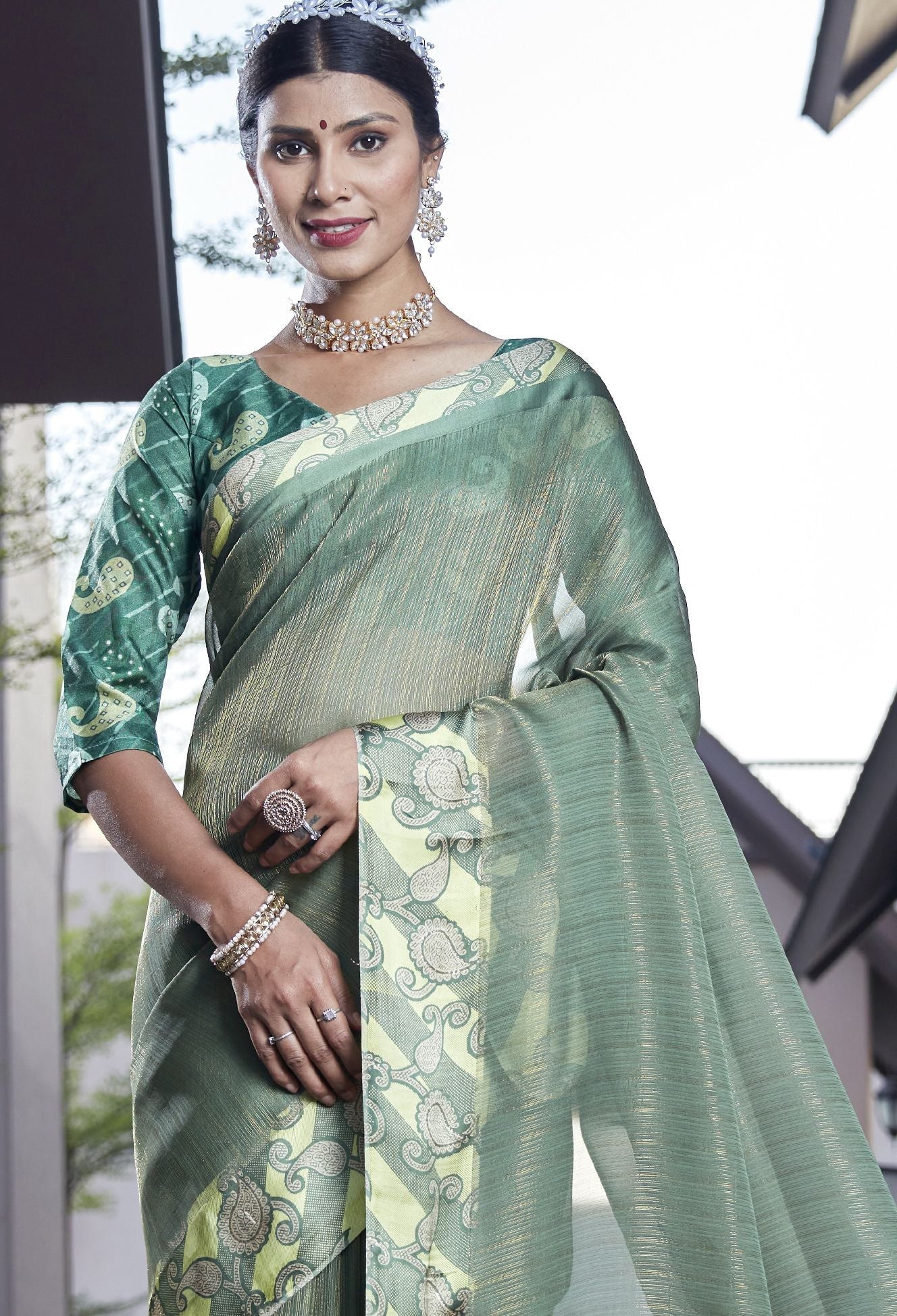 Enchanting Emerald Elegance: Green Soft Silk Saree for Weddings and Parties