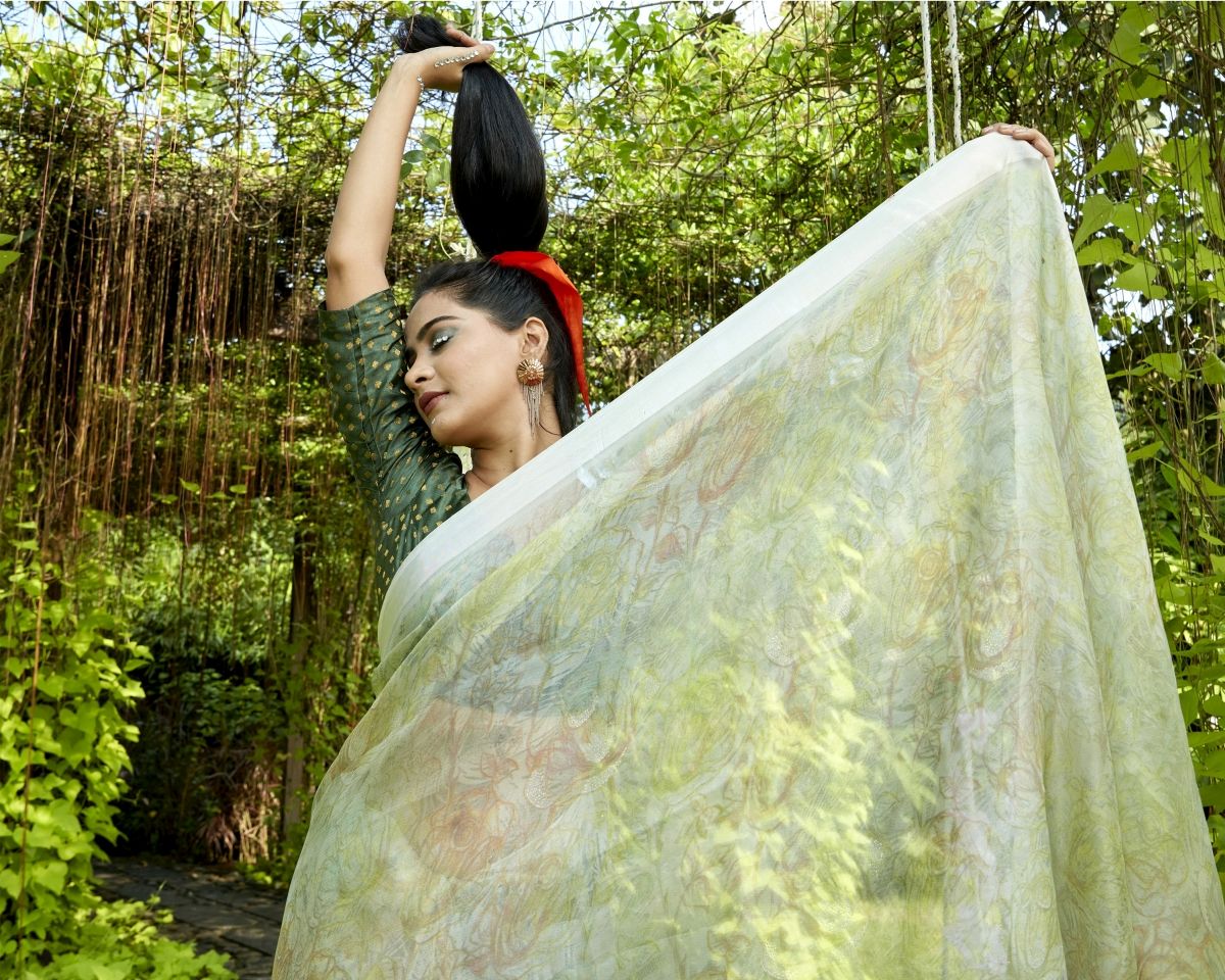 Enchanting Emerald: Green Soft Silk Saree for Weddings and Parties