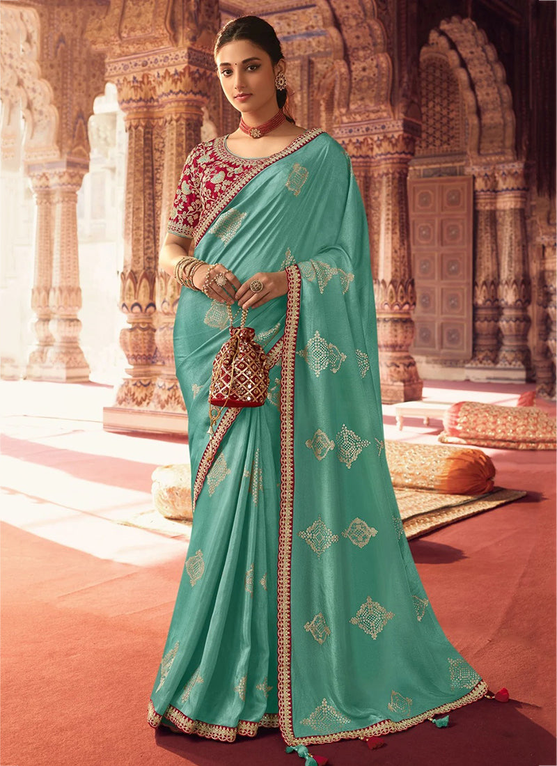 Elegance in Teal: A Soft Silk Saree Fit for Weddings and Parties