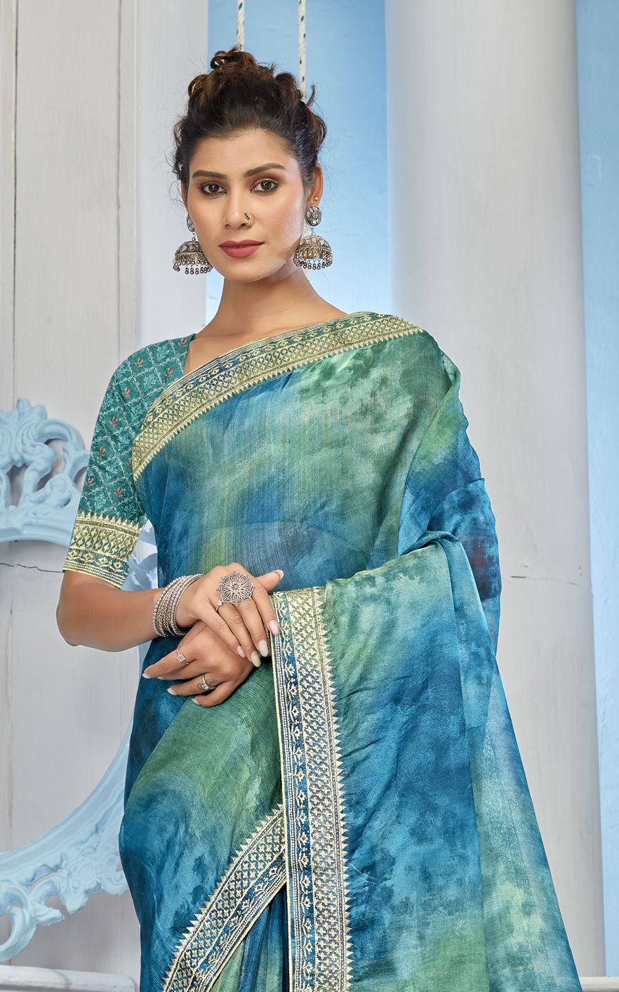 Elegance Embodied: Turquoise Organza Soft Silk Saree for Parties and Wedding