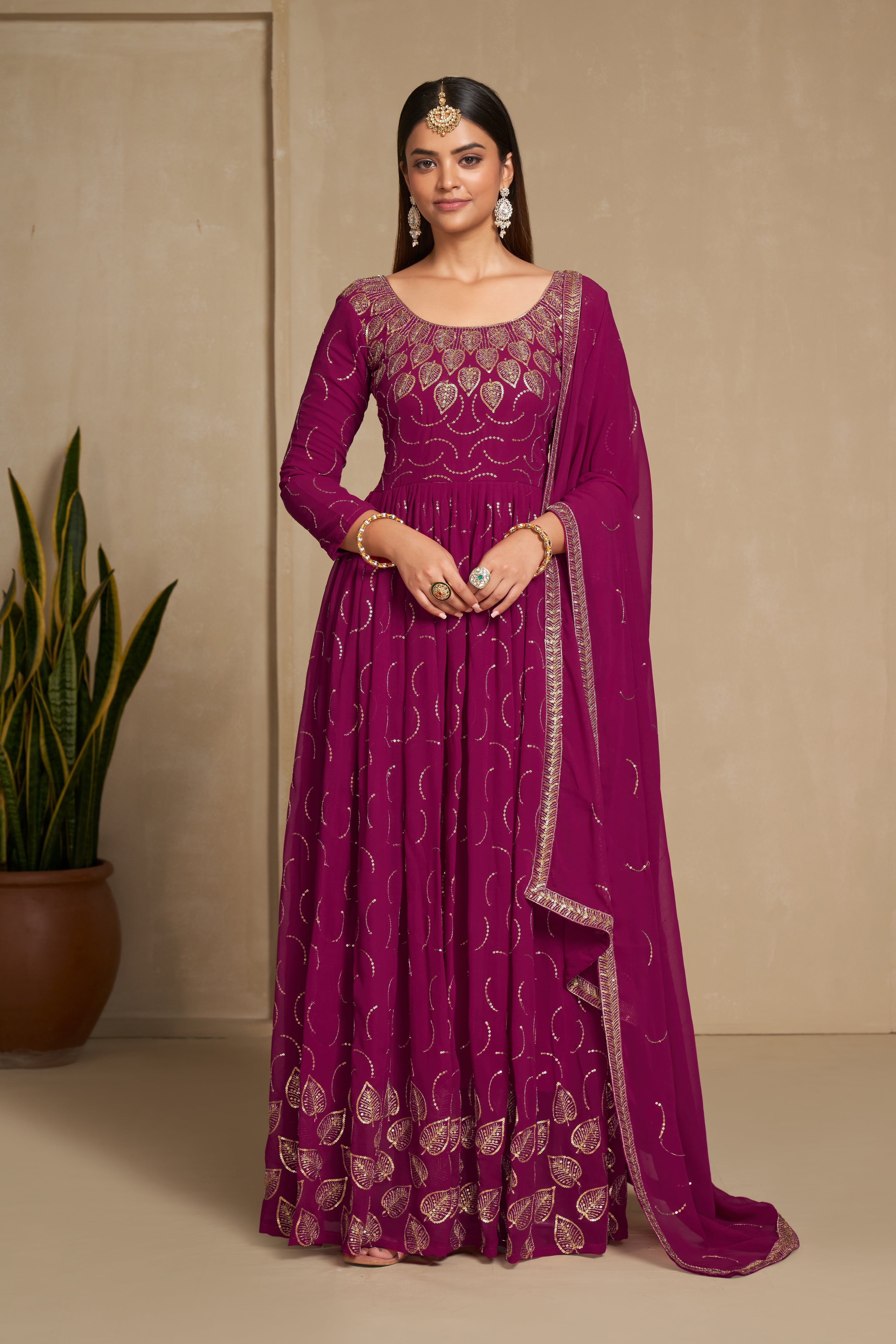 Pink Elegance: Zari & Sequins Embroidered Faux Georgette Gown for Weddings & Parties