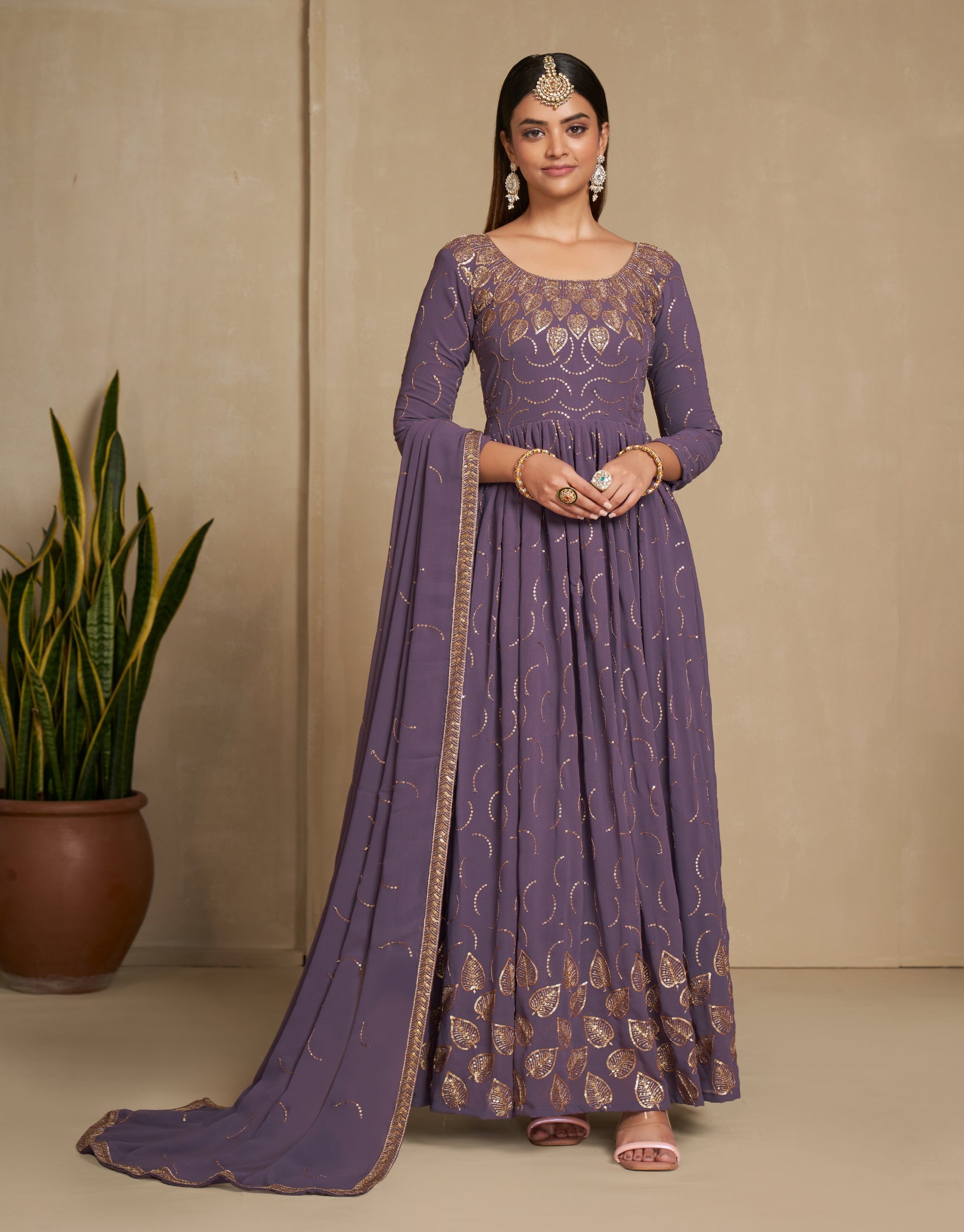 Elegant Purple Zari & Sequins Embroidered Faux Georgette Gown for Weddings & Parties