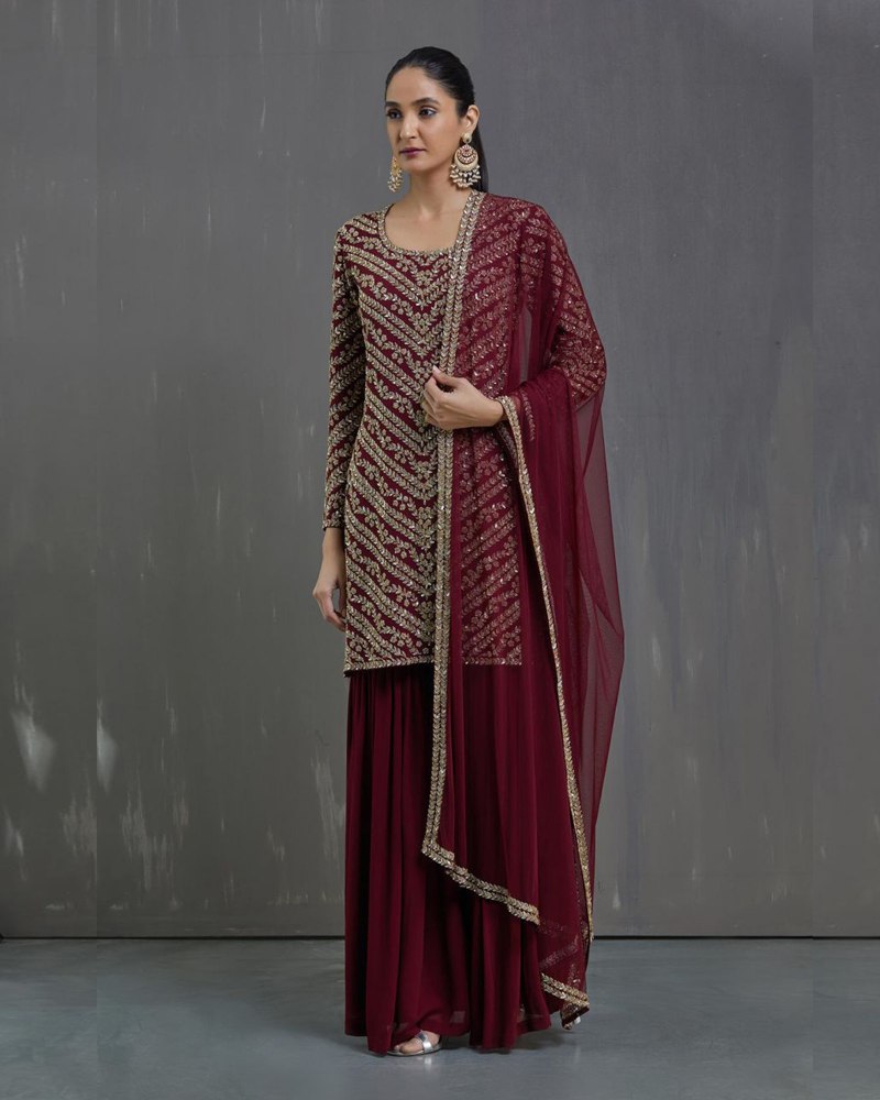 Elegant Red Sharara Salwar Suit with Intricate Thread and Sequin Embellishments